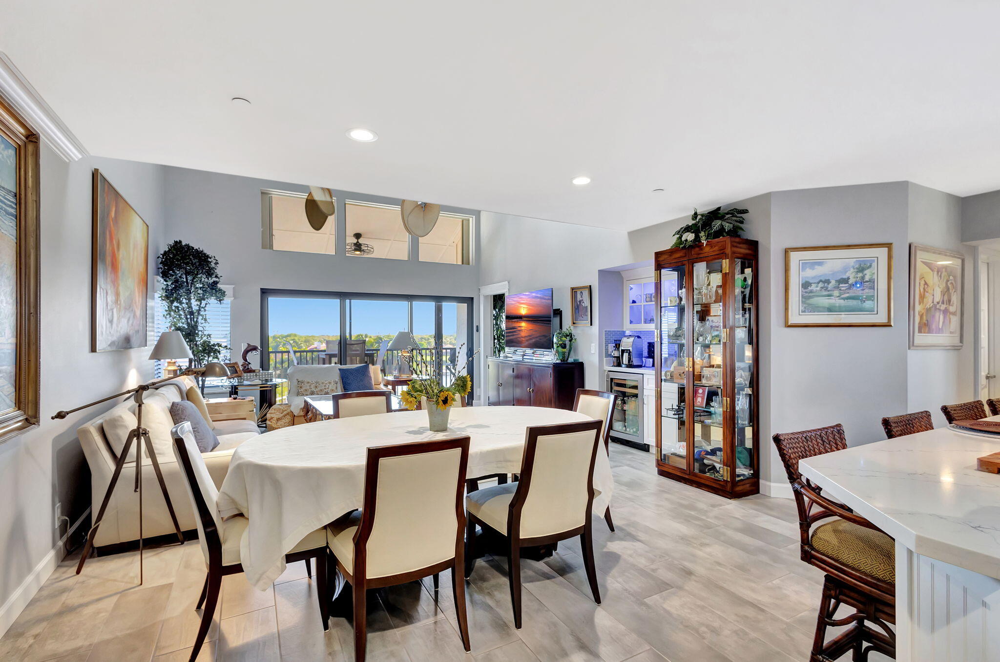 16910 Bay Street, Unit E503 Jupiter, FL 33477 - Photo 26 of 33 a dining room with furniture and window