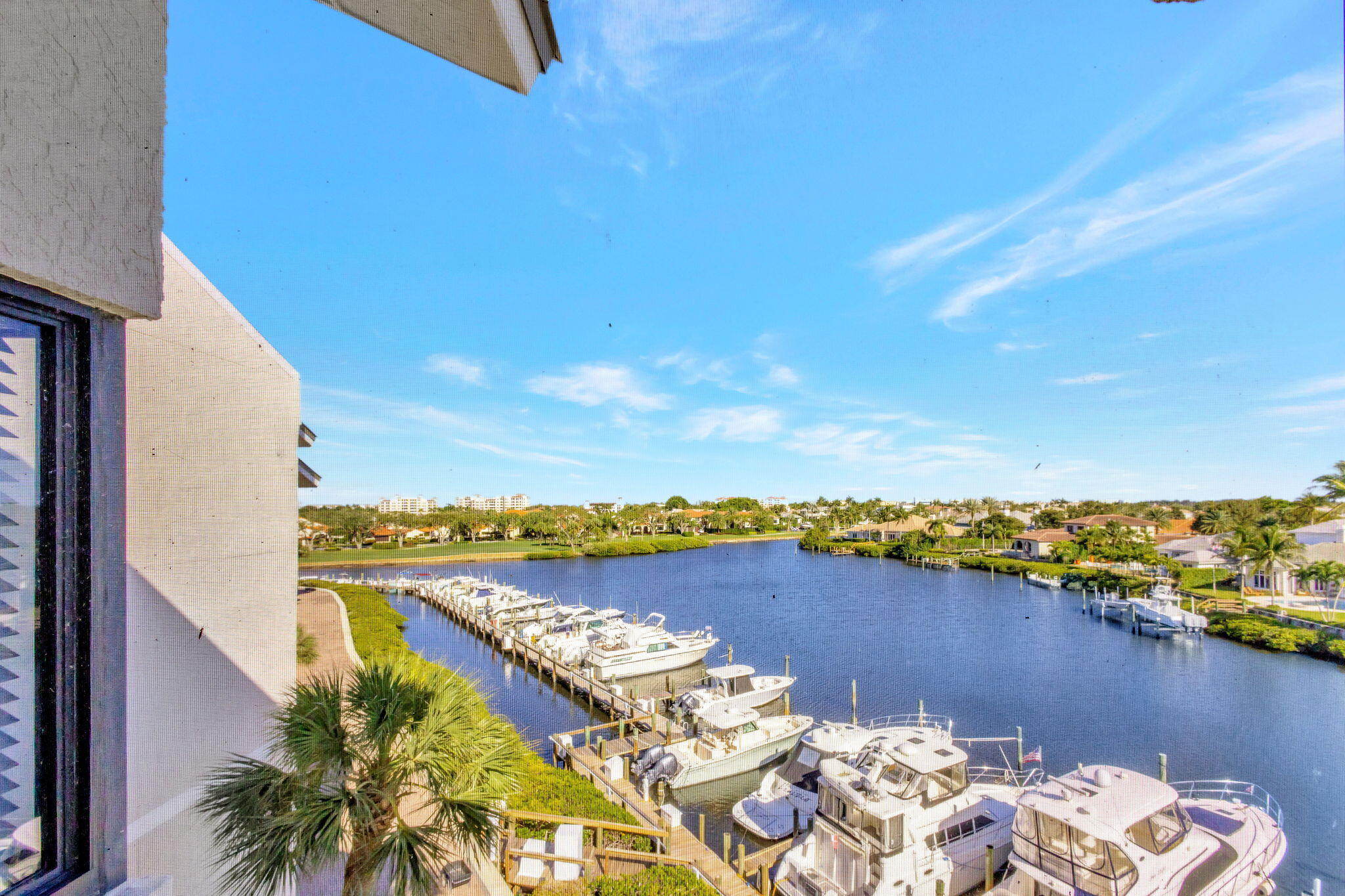 16910 Bay Street, Unit E503 Jupiter, FL 33477 - Photo 29 of 33 a view of a lake with outdoor space