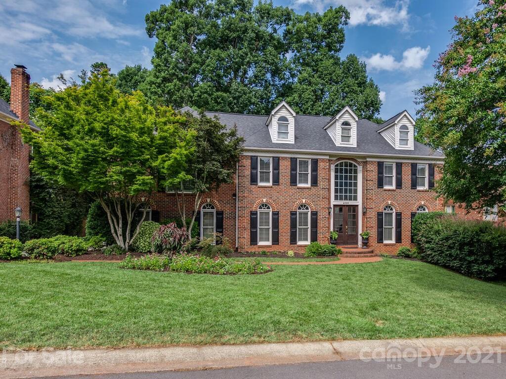 4626 Binfords Ridge Road Charlotte, NC 28226 - Photo 1 of 42 a front view of a house with garden