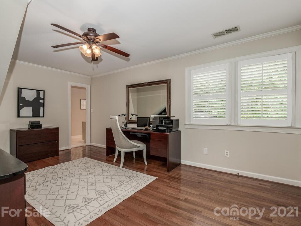 4626 Binfords Ridge Road Charlotte, NC 28226 - Photo 26 of 42 a living room with furniture and a wooden floor