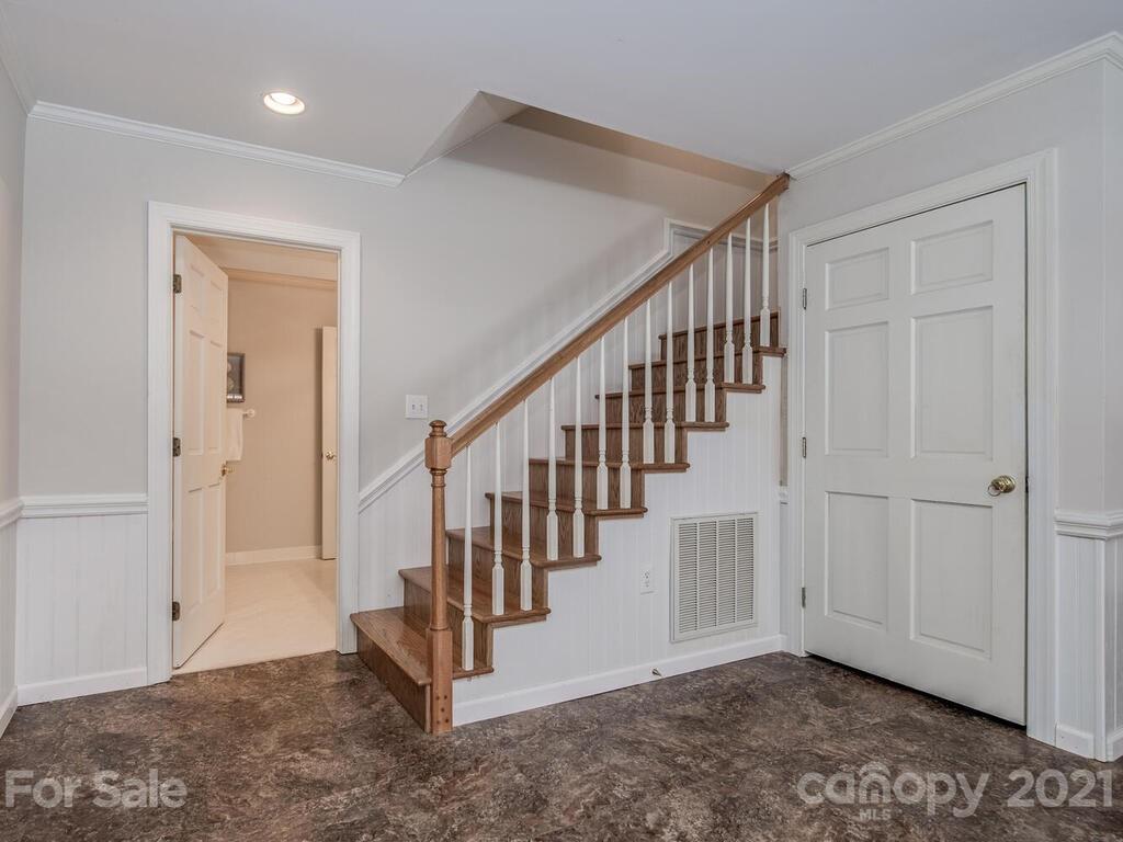 4626 Binfords Ridge Road Charlotte, NC 28226 - Photo 30 of 42 a view of a hallway with staircase