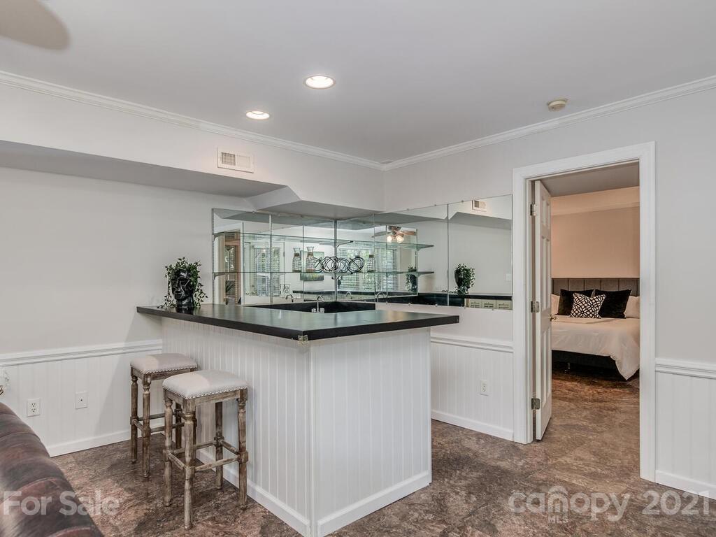 4626 Binfords Ridge Road Charlotte, NC 28226 - Photo 33 of 42 a kitchen with counter space and breakfast area