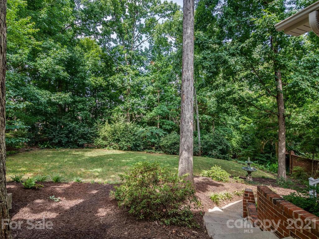 4626 Binfords Ridge Road Charlotte, NC 28226 - Photo 41 of 42 a view of a garden with a tree