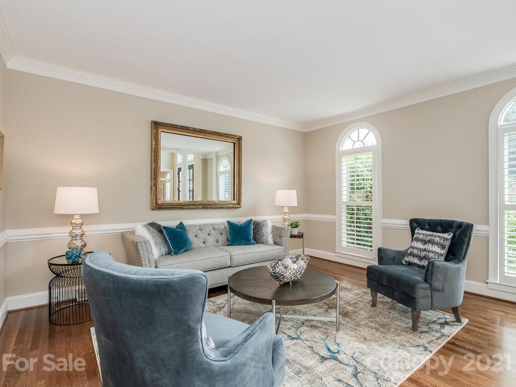 4626 Binfords Ridge Road Charlotte, NC 28226 - Photo 7 of 42 a living room with furniture and wooden floor