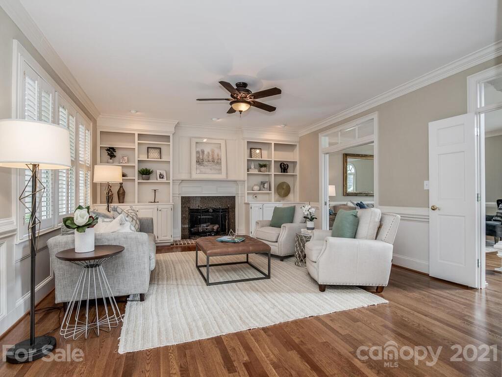 4626 Binfords Ridge Road Charlotte, NC 28226 - Photo 8 of 42 a living room with furniture and a fireplace
