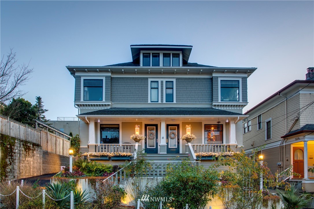 1415 East Spring Street Seattle, WA 98122 - Photo 2 of 38 front view of a house with a yard