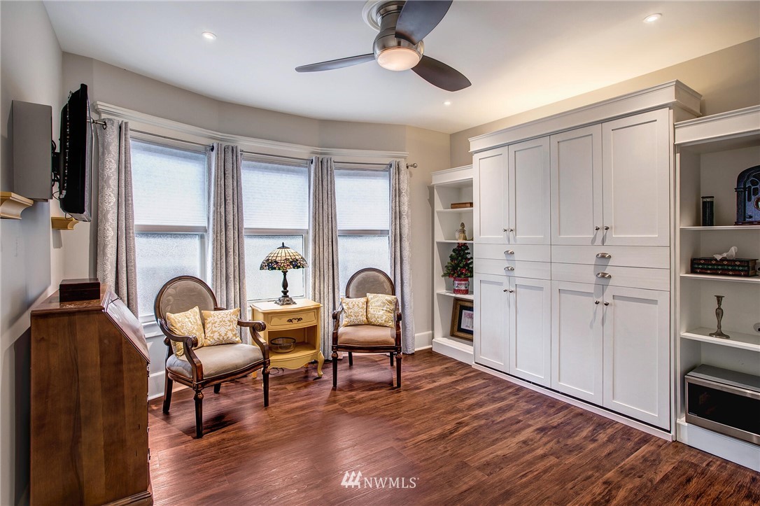 1415 East Spring Street Seattle, WA 98122 - Photo 16 of 38 a workspace with furniture window and outside view