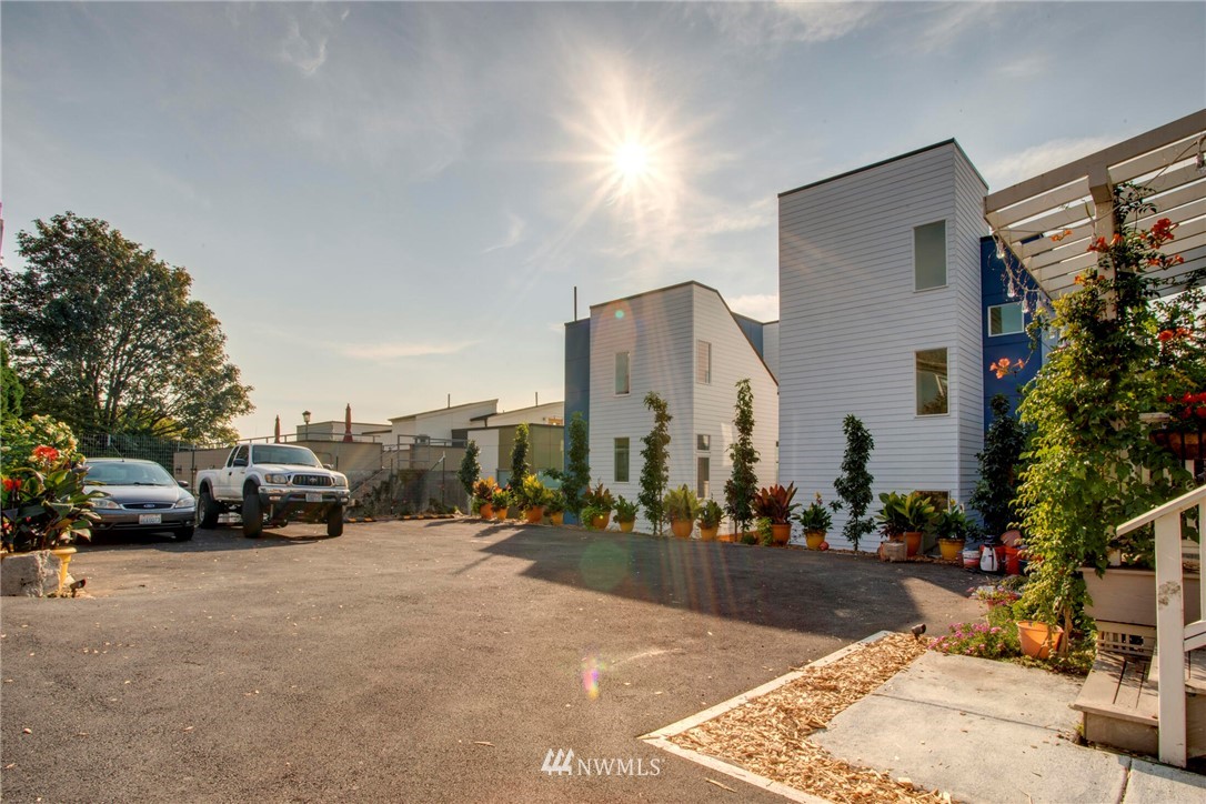 1415 East Spring Street Seattle, WA 98122 - Photo 31 of 38 a view of street with parked cars