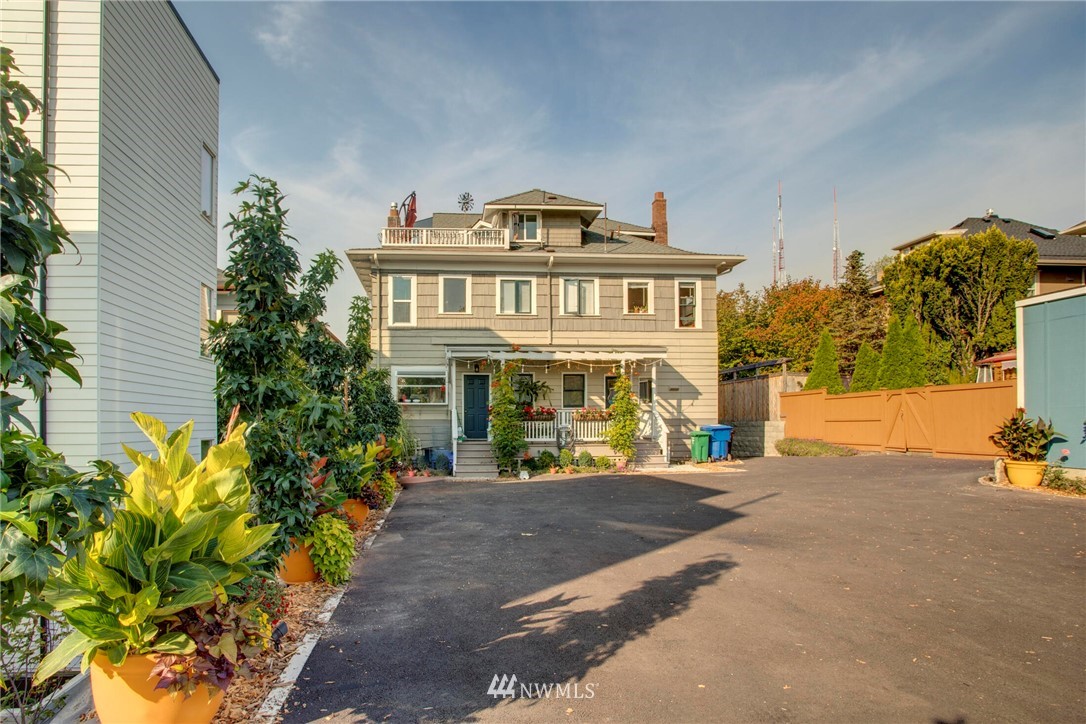 1415 East Spring Street Seattle, WA 98122 - Photo 32 of 38 a view of a building with a garden and pathway