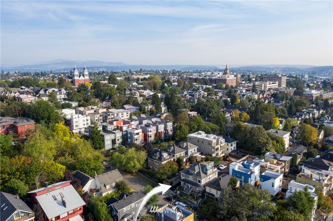 1415 East Spring Street Seattle, WA 98122 - Photo 38 of 38 an aerial view of a city with lots of residential buildings
