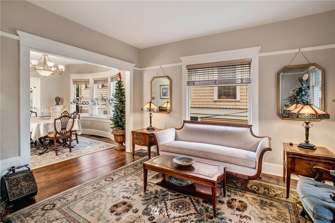 1415 East Spring Street Seattle, WA 98122 - Photo 6 of 38 a living room with furniture a rug and a window