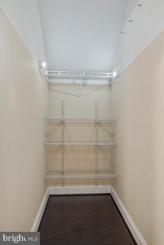 8045 Gatehouse Road, Unit 17 Falls Church, VA 22042 - Photo 15 of 32 a view of a room with racks on the wall