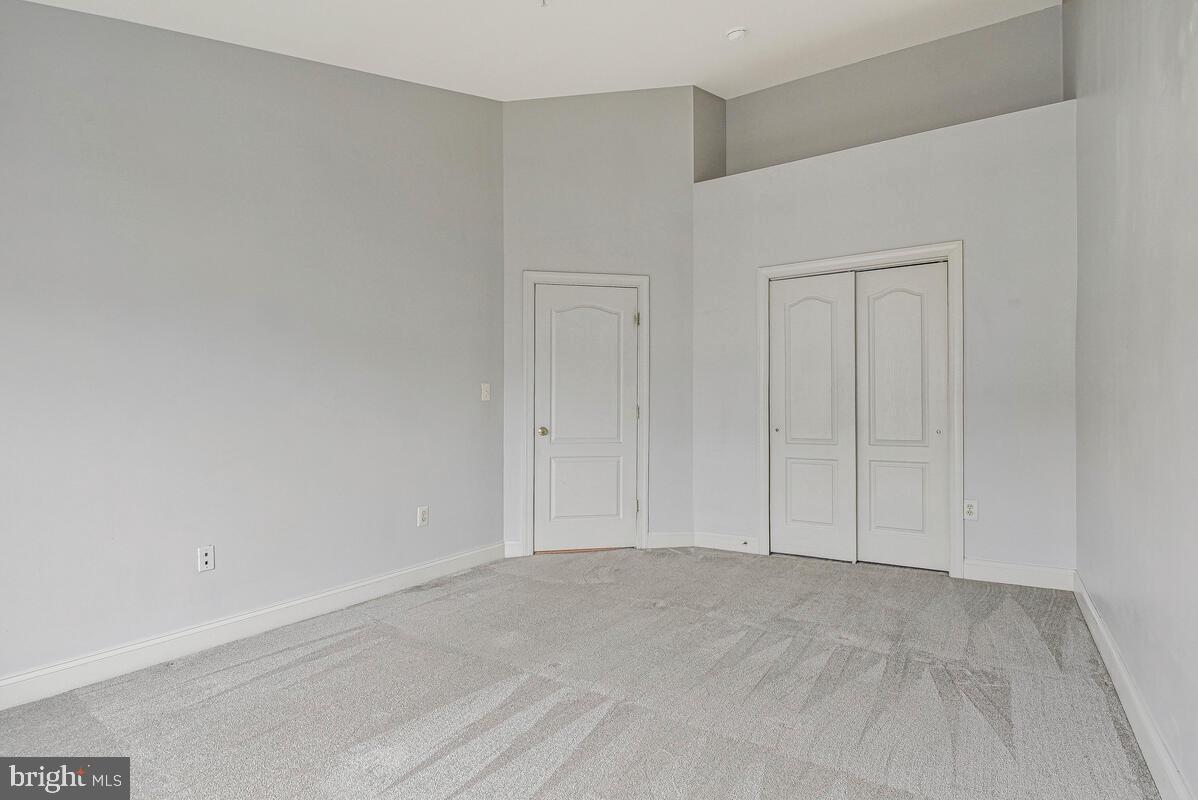 8045 Gatehouse Road, Unit 17 Falls Church, VA 22042 - Photo 17 of 32 a view of an empty room