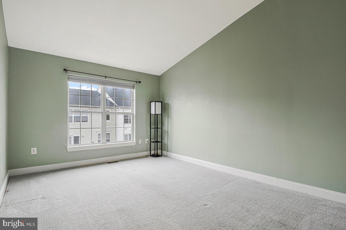 8045 Gatehouse Road, Unit 17 Falls Church, VA 22042 - Photo 18 of 32 a view of an empty room with a window