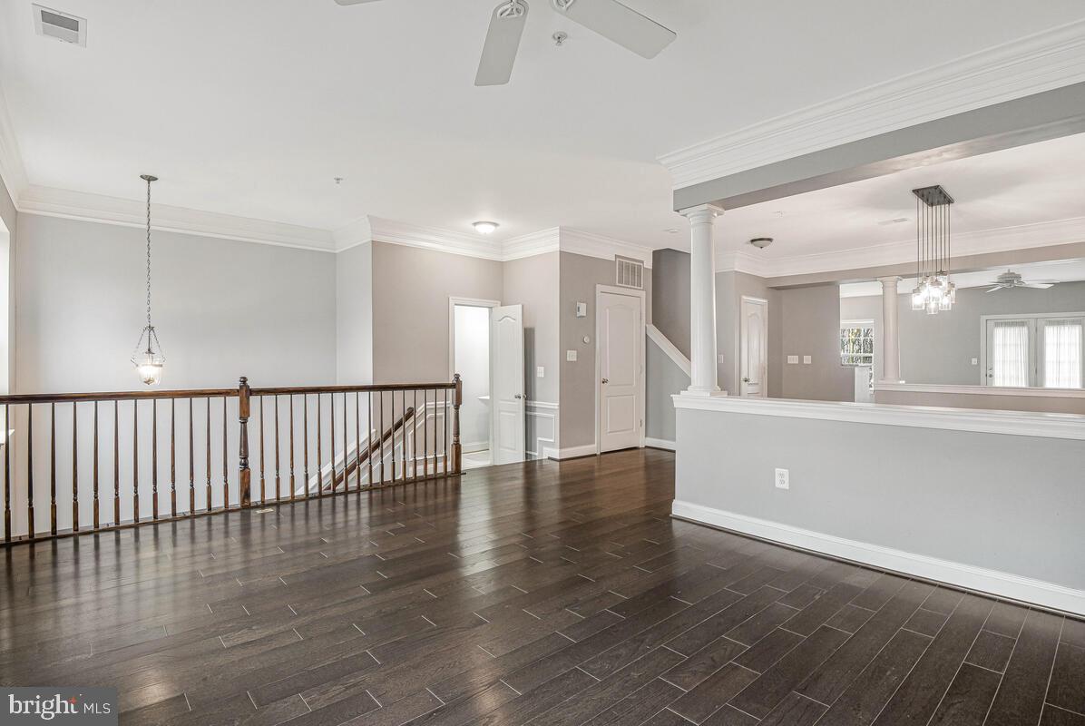 8045 Gatehouse Road, Unit 17 Falls Church, VA 22042 - Photo 3 of 32 a view of an entryway with wooden floor