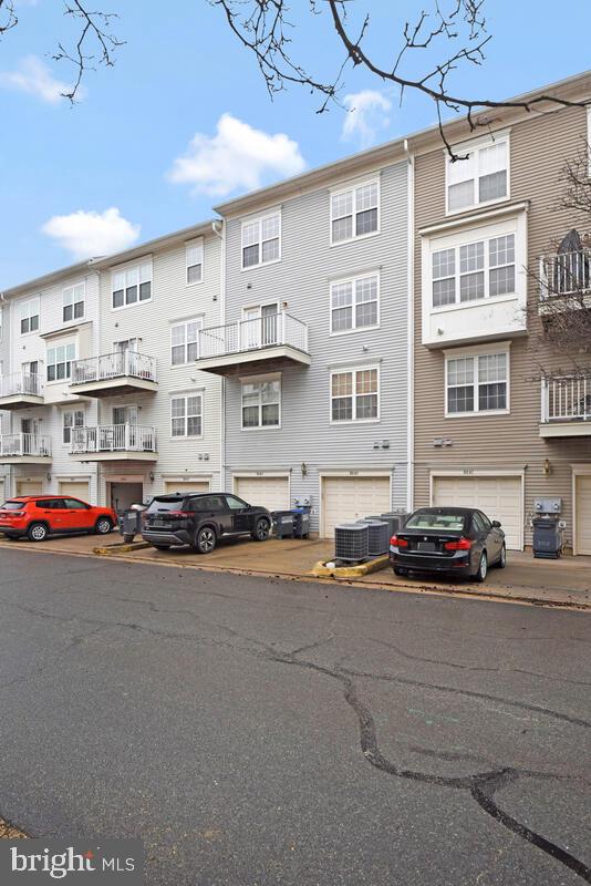 8045 Gatehouse Road, Unit 17 Falls Church, VA 22042 - Photo 31 of 32 a cars parked in front of a building