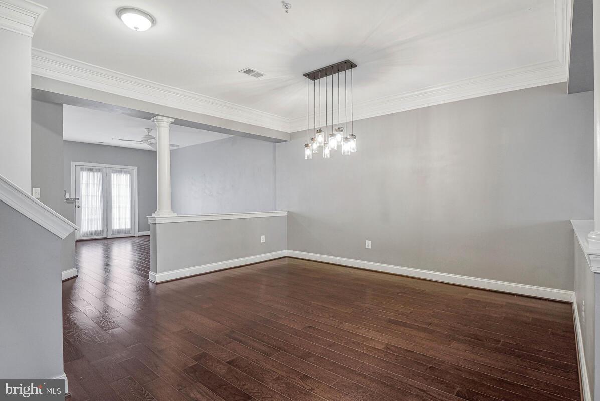 8045 Gatehouse Road, Unit 17 Falls Church, VA 22042 - Photo 6 of 32 a view of empty room with wooden floor