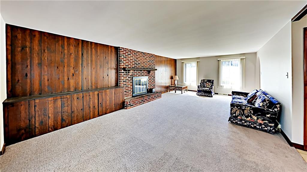 218 Ridgeview Drive Wexford, PA 15090 - Photo 5 of 25 Family room includes log burning fireplace.