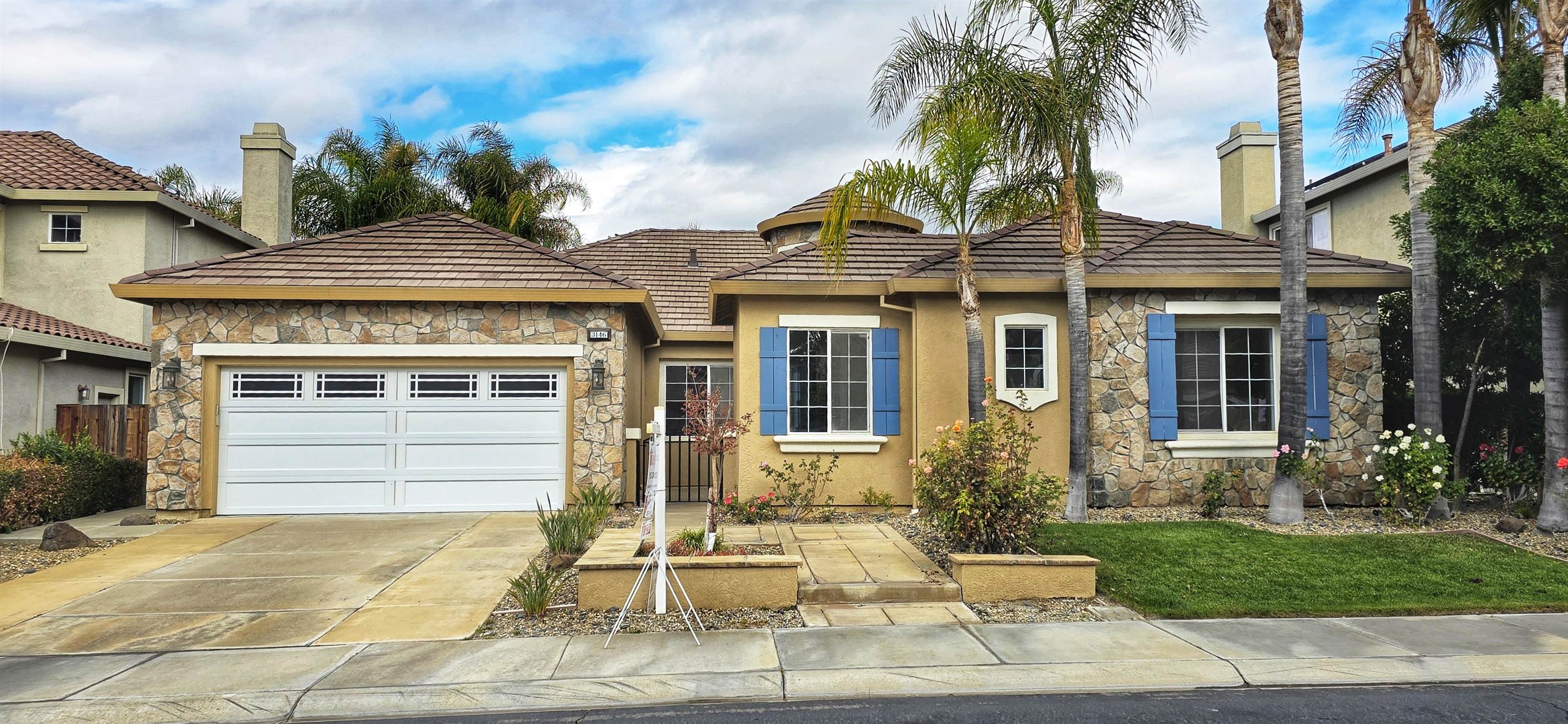 3146 Castle Rock Loop Discovery Bay, CA 94505 - Photo 1 of 49 a front view of a house with garden