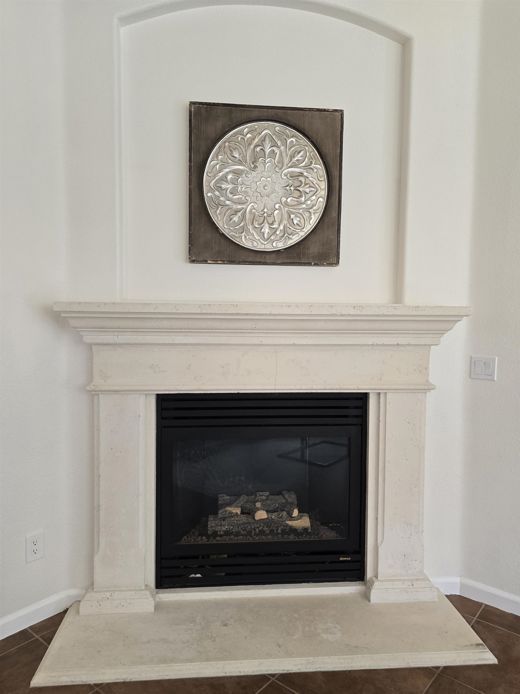 3146 Castle Rock Loop Discovery Bay, CA 94505 - Photo 13 of 49 a fireplace with a clock on wall