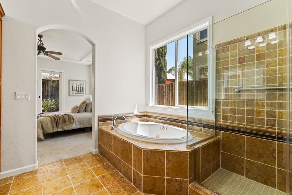 3146 Castle Rock Loop Discovery Bay, CA 94505 - Photo 27 of 49 a spacious bathroom with a tub and a shower