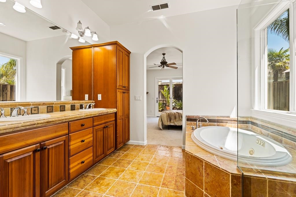 3146 Castle Rock Loop Discovery Bay, CA 94505 - Photo 28 of 49 a spacious bathroom with a sink double vanity