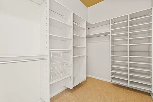 a view of an empty walk in closet