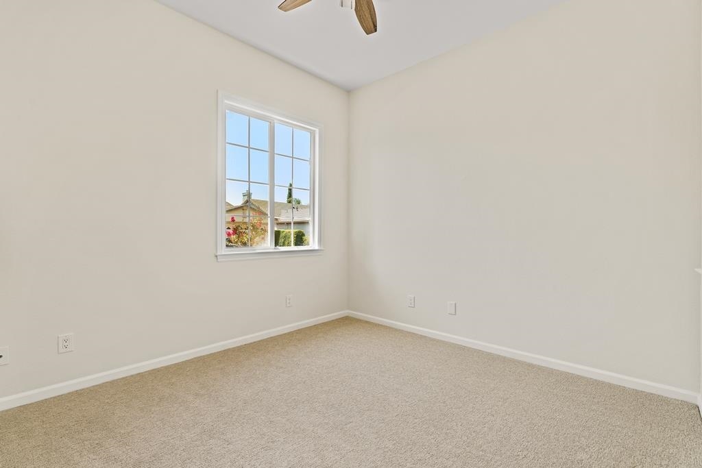 3146 Castle Rock Loop Discovery Bay, CA 94505 - Photo 32 of 49 an empty room with windows