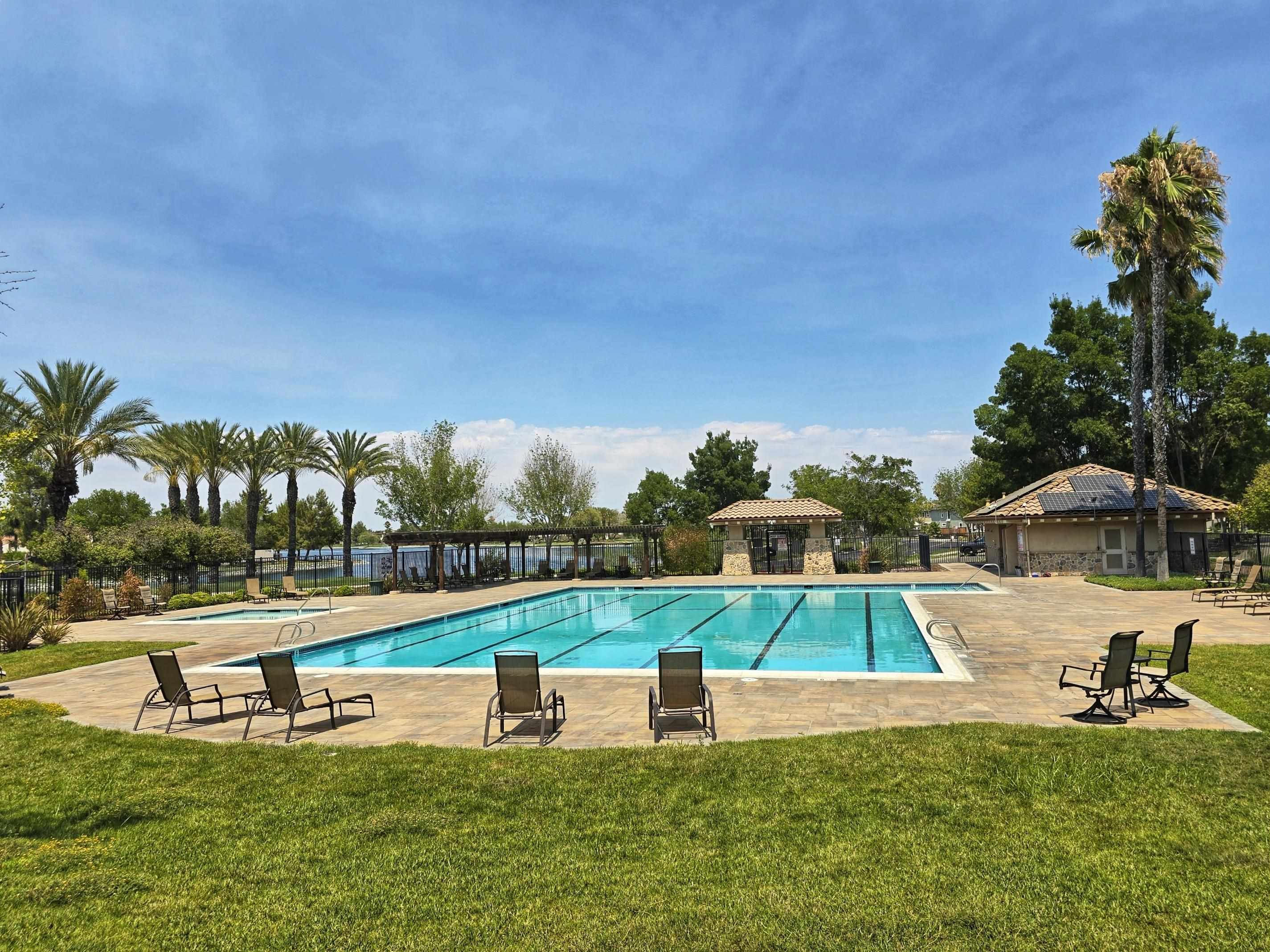 3146 Castle Rock Loop Discovery Bay, CA 94505 - Photo 42 of 49 a view of a swimming pool with an ocean view