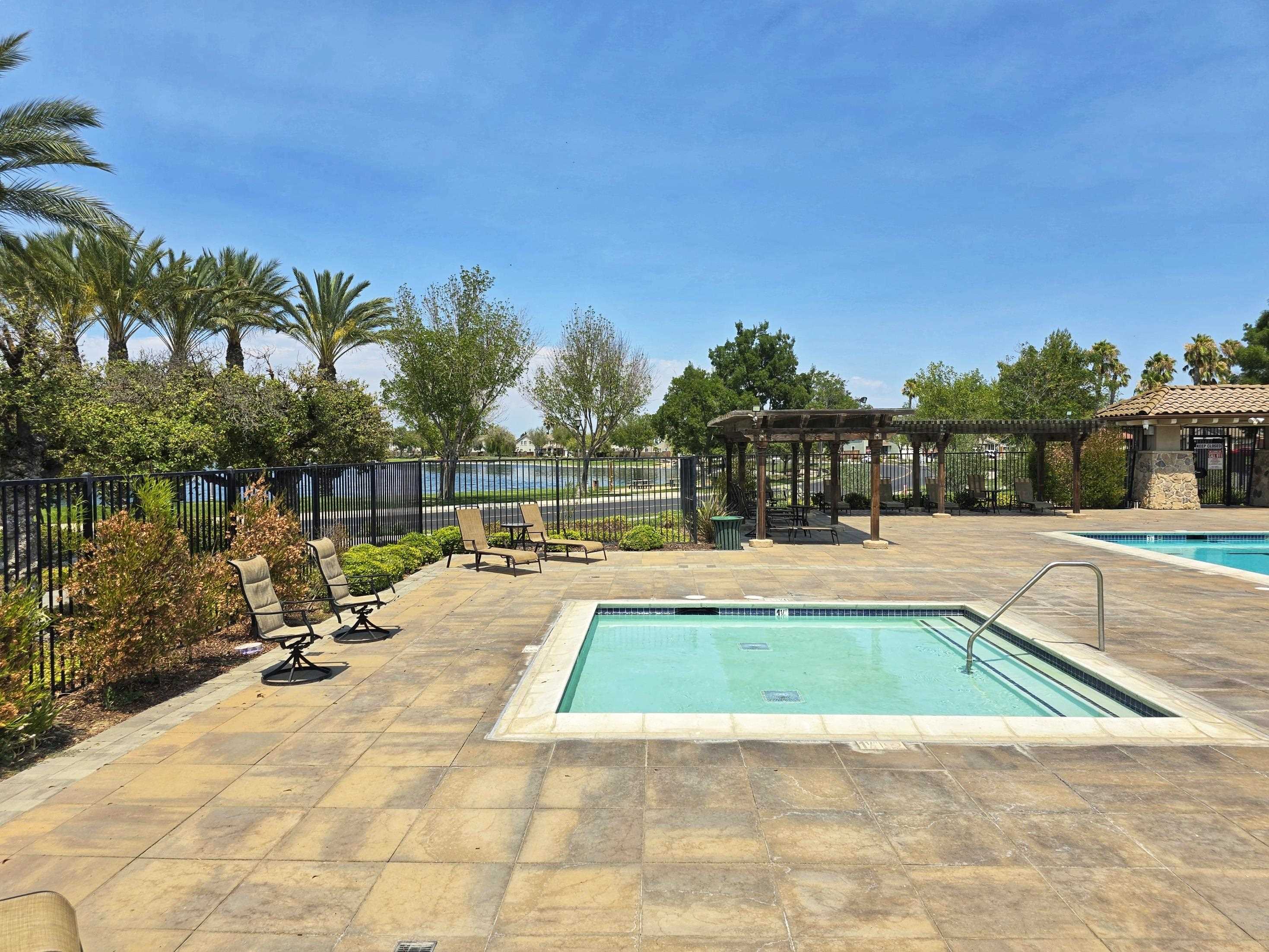 3146 Castle Rock Loop Discovery Bay, CA 94505 - Photo 43 of 49 a view of swimming pool with chairs
