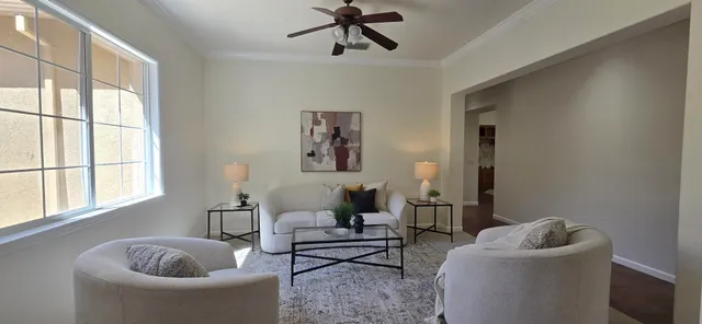 a living room with furniture and a window