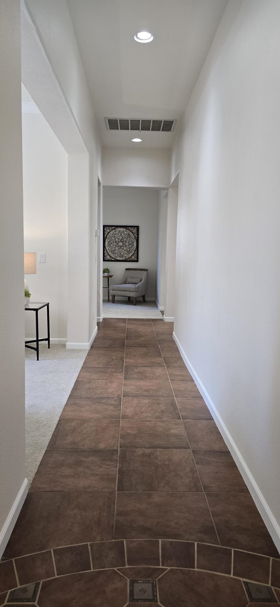 3146 Castle Rock Loop Discovery Bay, CA 94505 - Photo 10 of 49 a view of a hallway with wooden floor and a fireplace