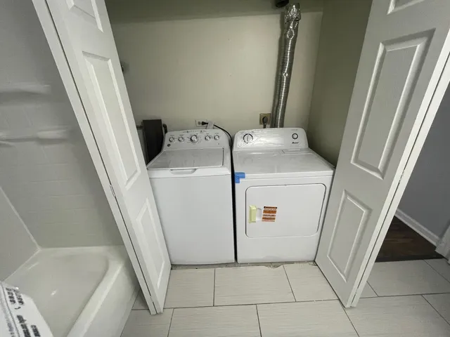 a view of a dinning table and chairs in patio