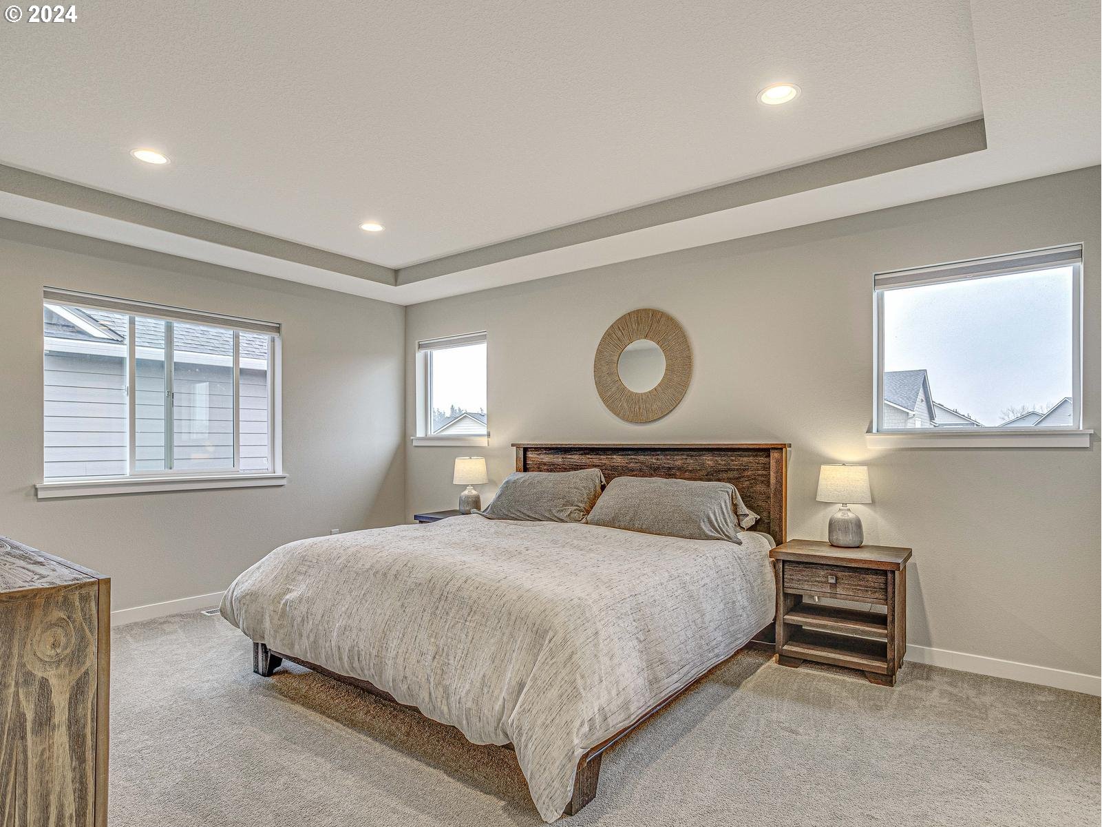 8708 North 3rd Way Ridgefield, WA 98642 - Photo 12 of 30 a bedroom with a bed and a window
