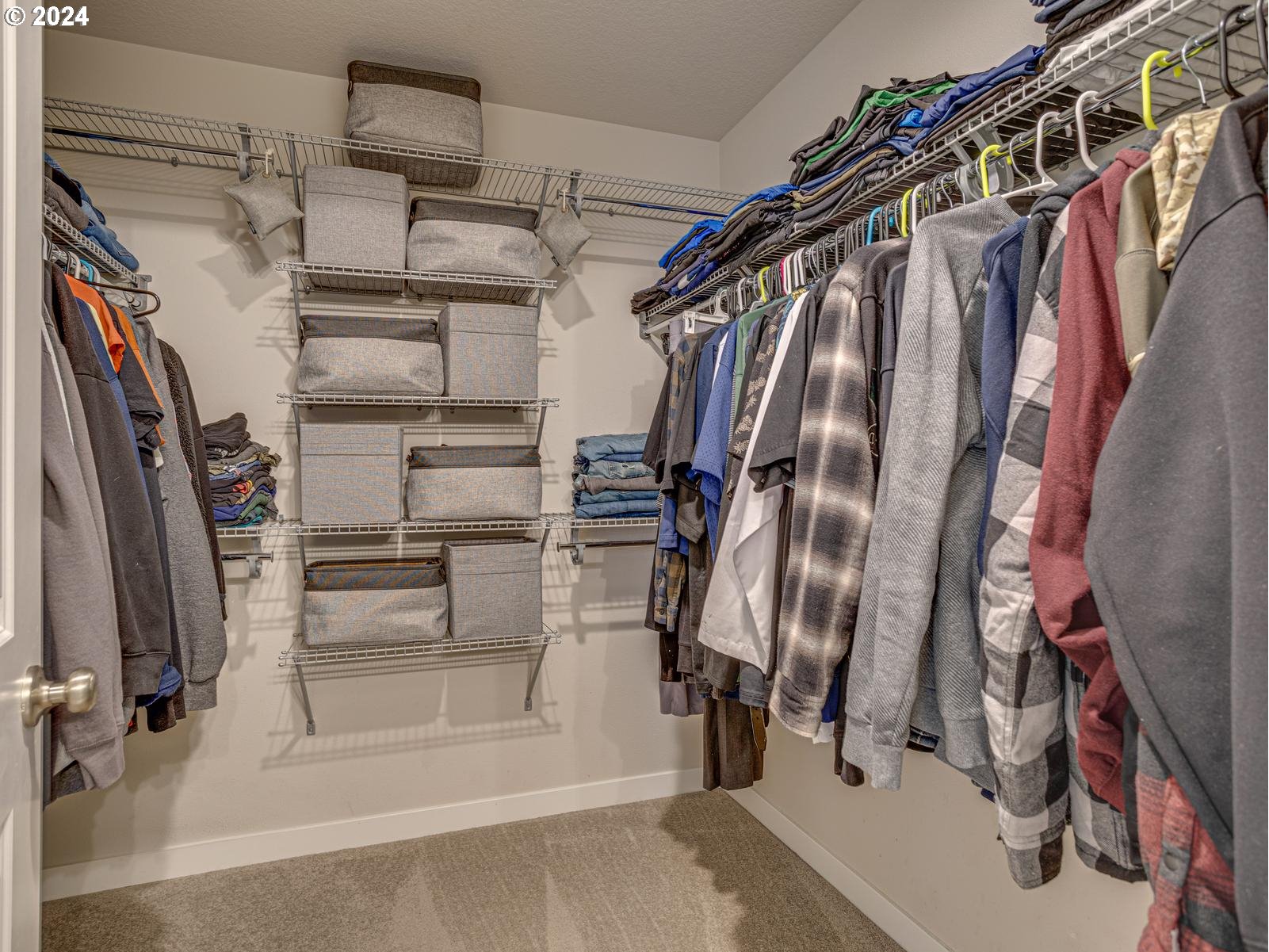 8708 North 3rd Way Ridgefield, WA 98642 - Photo 15 of 30 a view of walk in closet with clothes and shoes
