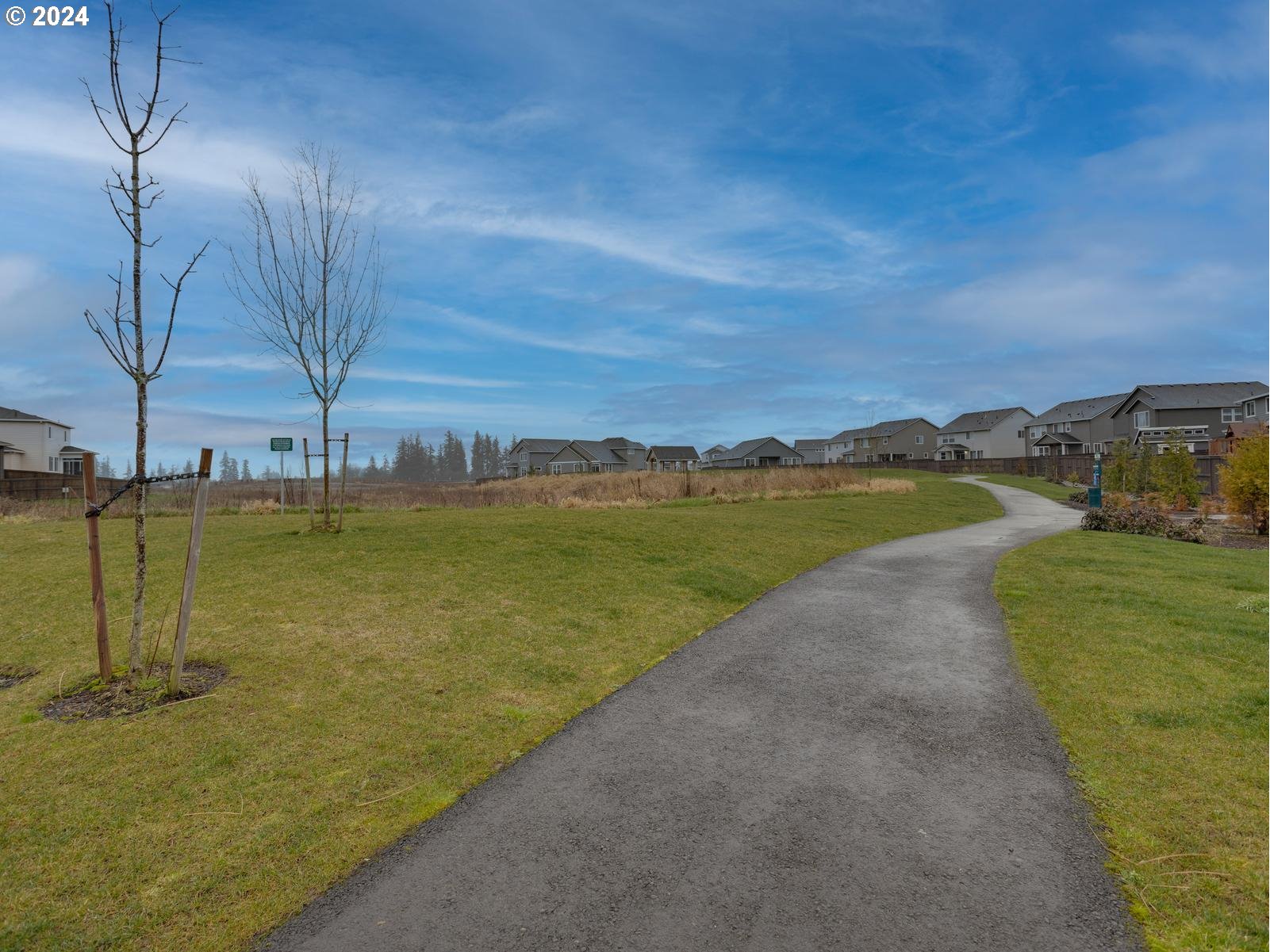8708 North 3rd Way Ridgefield, WA 98642 - Photo 27 of 30 a view of a lake with a big yard