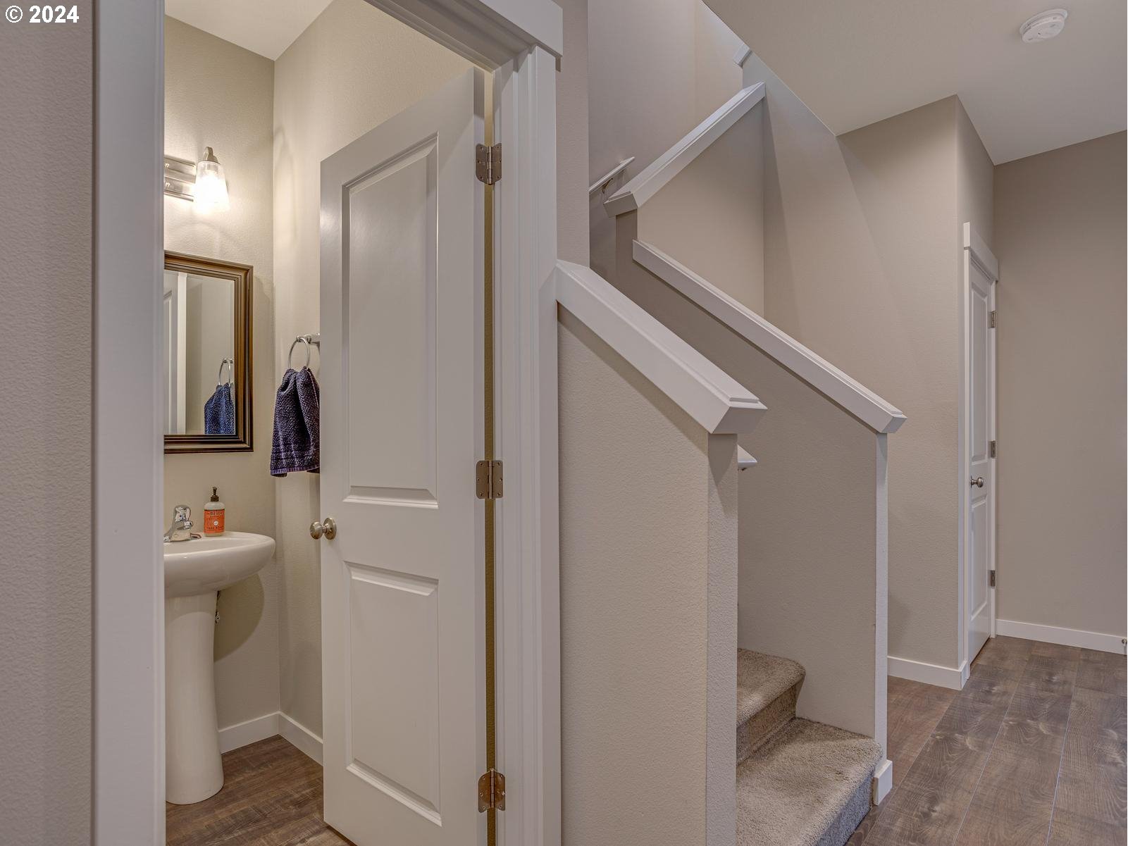 8708 North 3rd Way Ridgefield, WA 98642 - Photo 3 of 30 a bathroom with a toilet and a sink