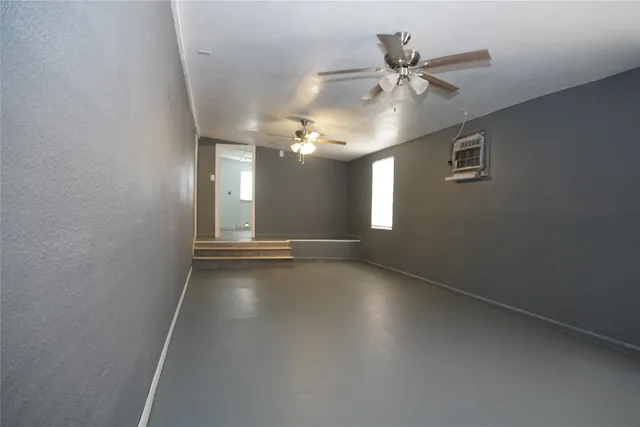 a front view of house with a garden