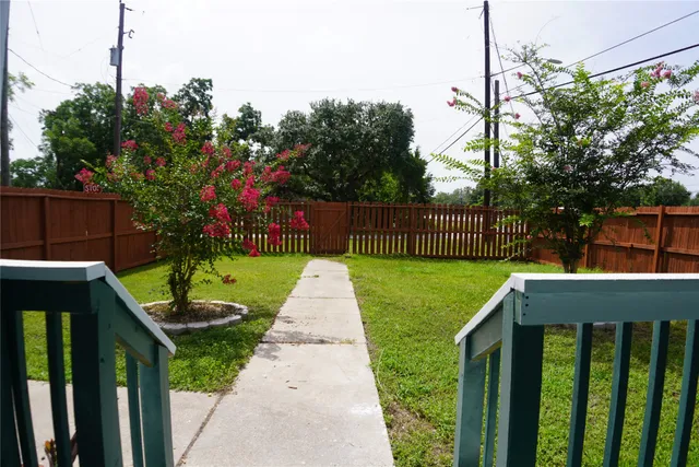 a view of a garden with a slide