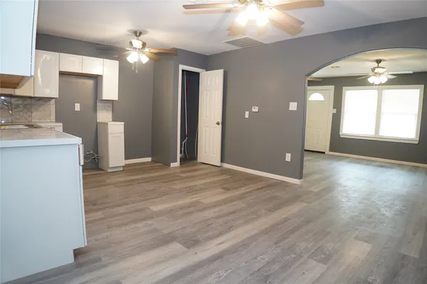 a view of a kitchen with a dishwasher cabinets and a kitchen