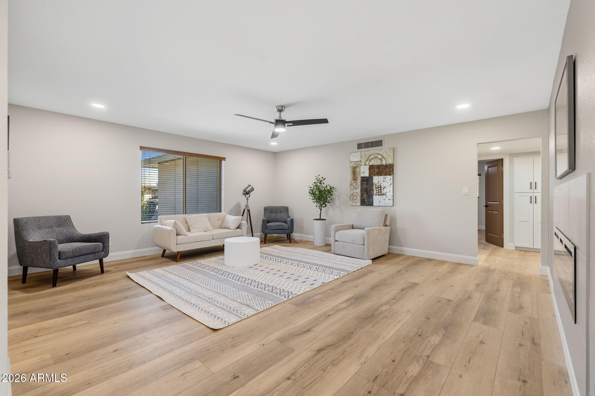 2901 East Las Rocas Drive Phoenix, AZ 85028 - Photo 24 of 47 a large bedroom with a bed and window
