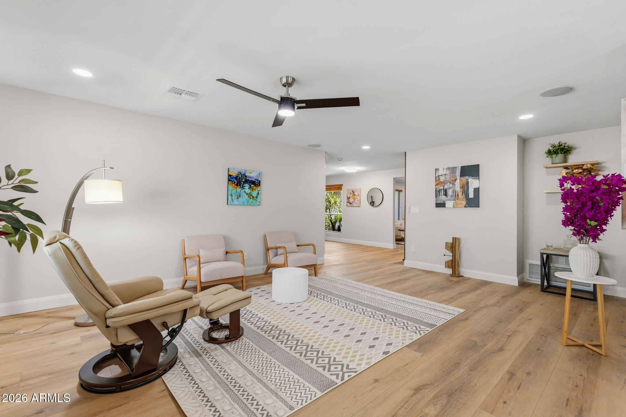 2901 East Las Rocas Drive Phoenix, AZ 85028 - Photo 3 of 47 a living room with furniture and wooden floor