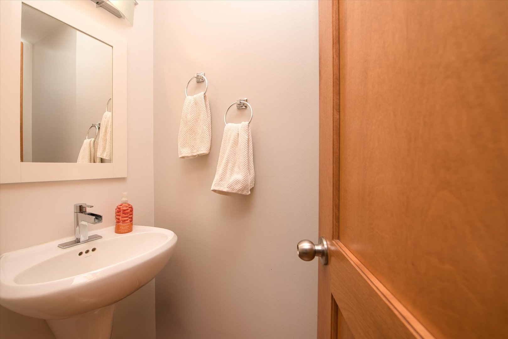 1196 Nottingham Lane Elgin, IL 60120 - Photo 28 of 45 a bathroom with a sink and mirror
