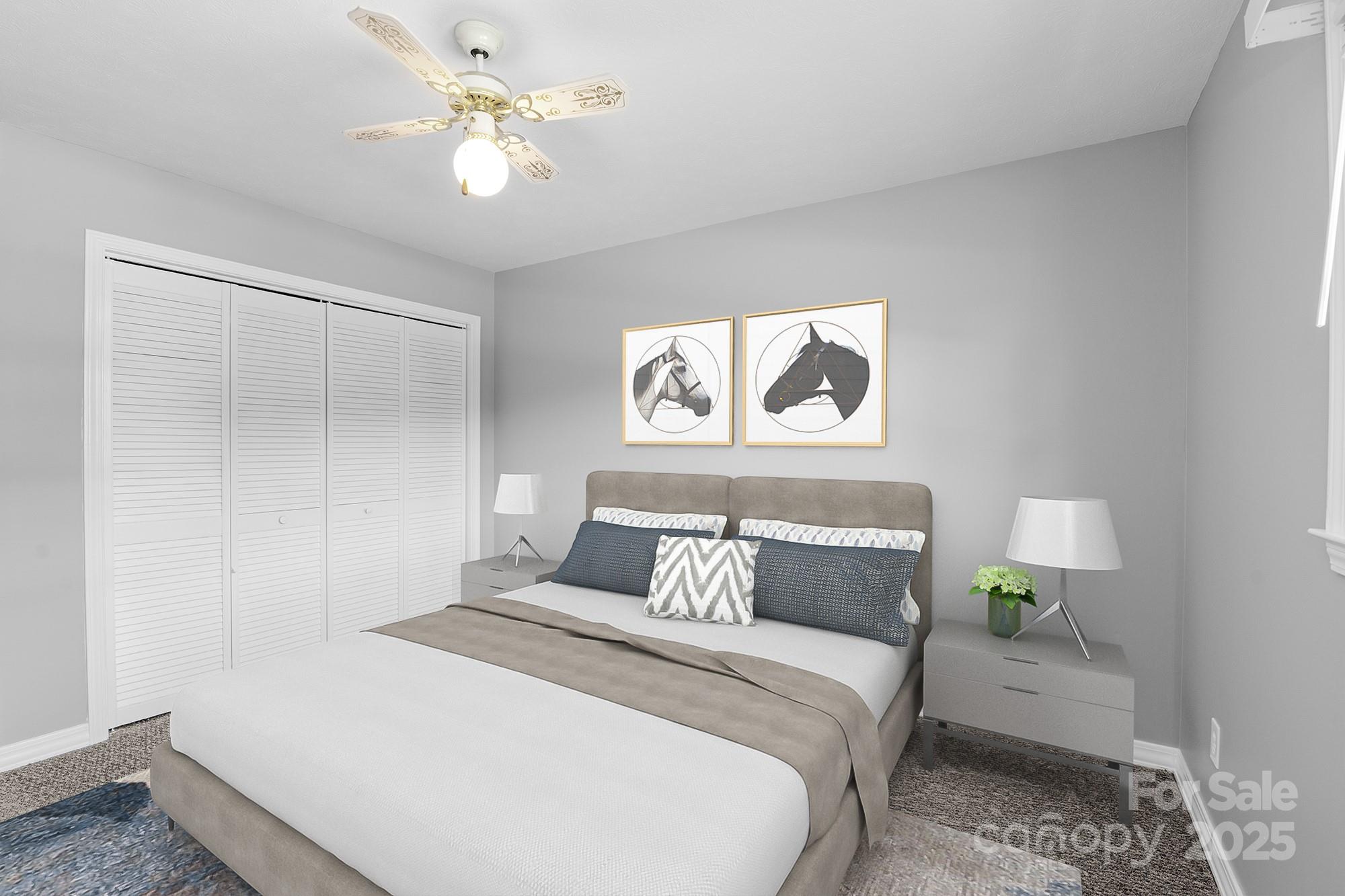 111 Curtis Creek Road Candler, NC 28715 - Photo 16 of 28 a bedroom with a bed and a painting on the wall