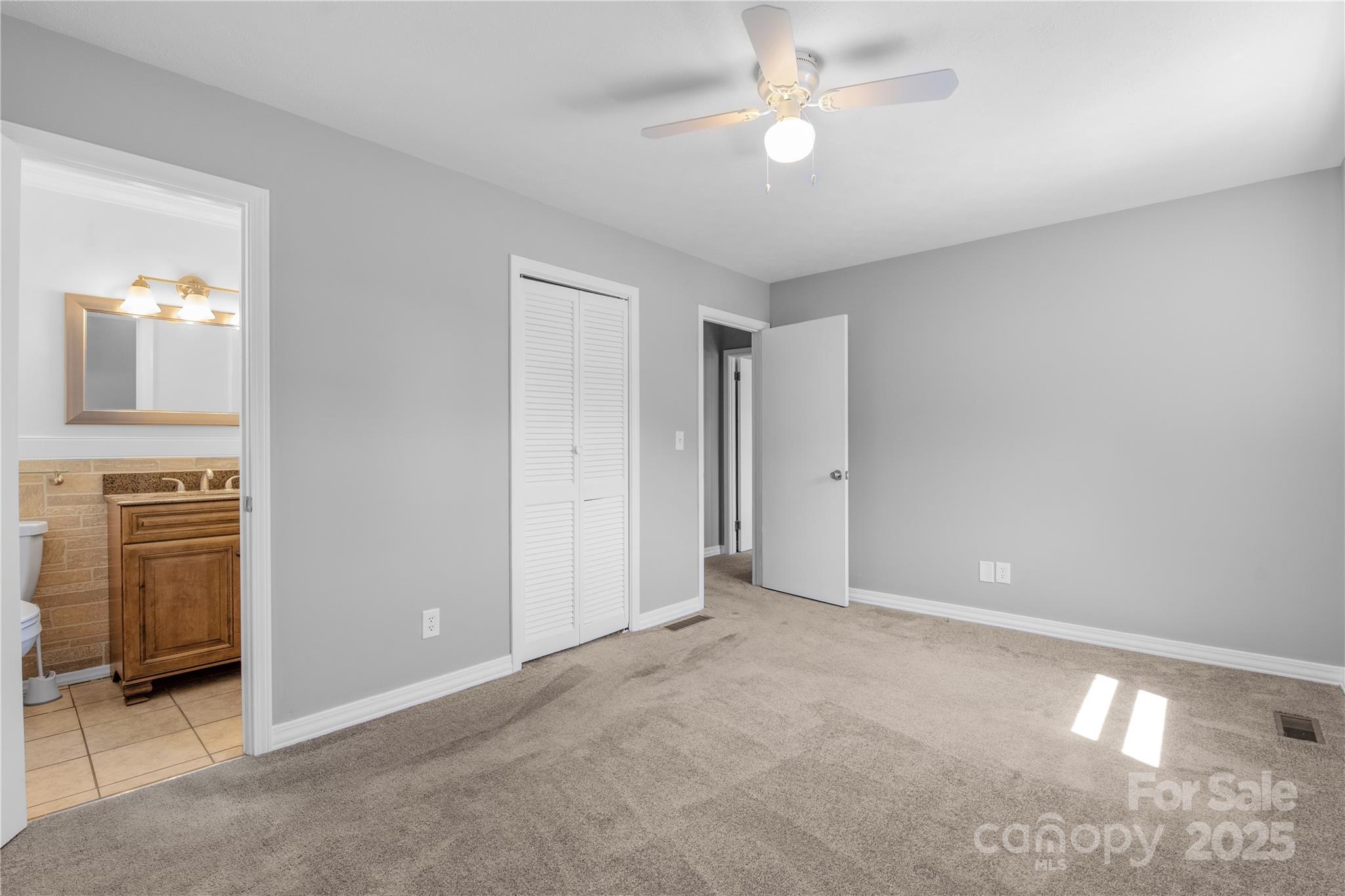 111 Curtis Creek Road Candler, NC 28715 - Photo 19 of 28 a view of an empty room with a fireplace