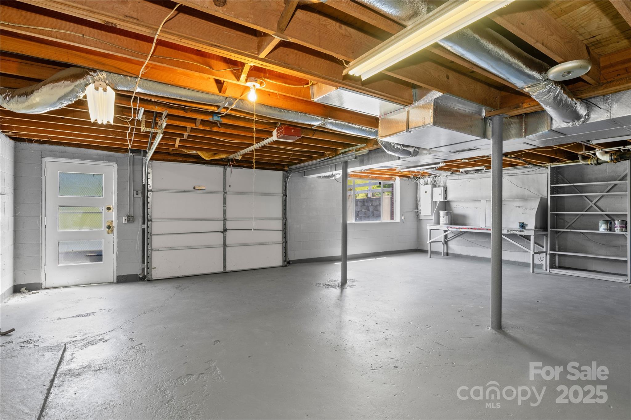 111 Curtis Creek Road Candler, NC 28715 - Photo 22 of 28 a view of a room with storage and utility