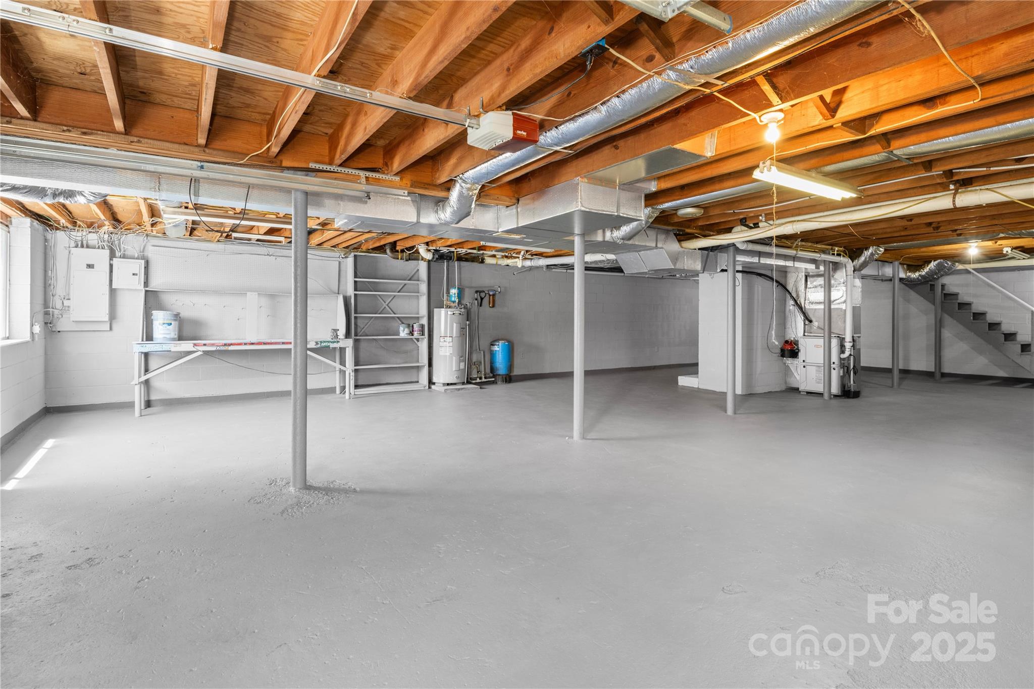 111 Curtis Creek Road Candler, NC 28715 - Photo 23 of 28 a view of empty room with wooden ceiling