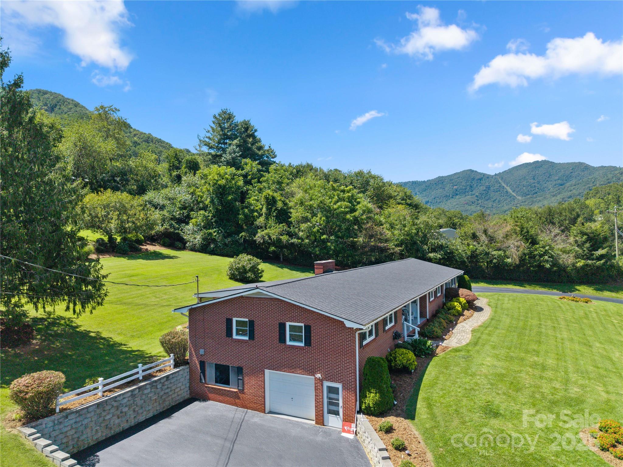 111 Curtis Creek Road Candler, NC 28715 - Photo 27 of 28 a view of a city from a balcony