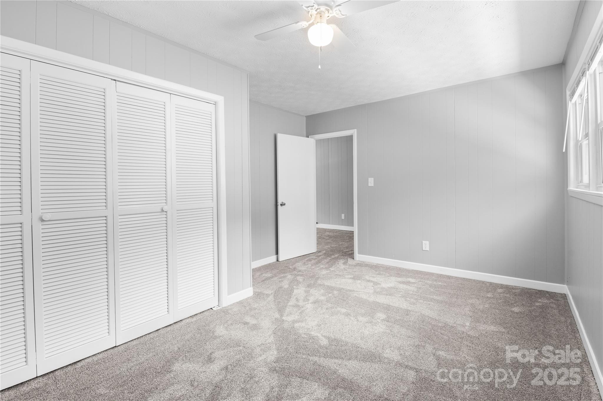 111 Curtis Creek Road Candler, NC 28715 - Photo 6 of 28 a view of an empty room with a window