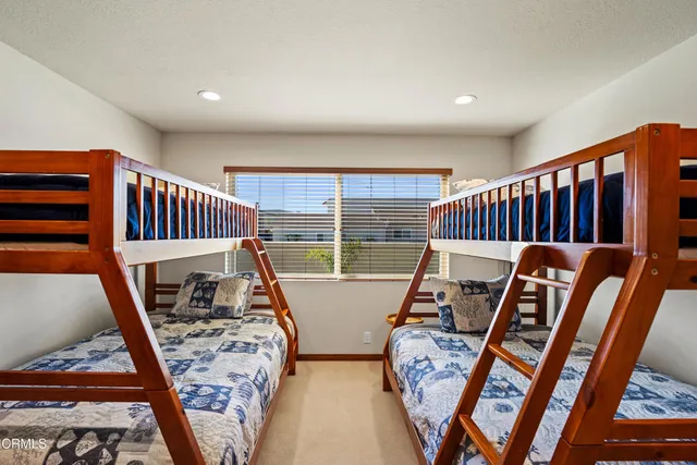 a view of a room with air conditioner duct and materials on floor